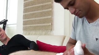Tyler Fox deepthroats thick cock barefoot and eager