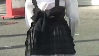 Voyeur enjoys recording Japanese hotties in daring skirts