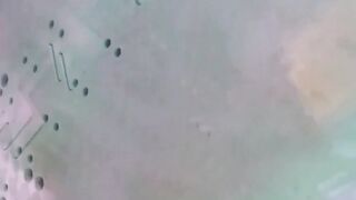 Asian women lift their panties to pee before a hidden camera