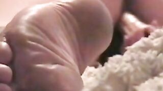 Girl Pleasures Herself with a Sex Toy from Behind