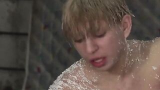 BoyDungeon.com - Blond young dude gets cleaned and dominated by two kinky guys