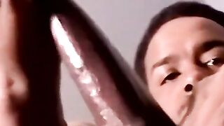 Young black amateur fists thick cock till creamy eruption