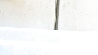Witness a lovely lady fill a container with her warm urine