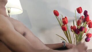Twink Adrian strokes cock while grabbing his balls