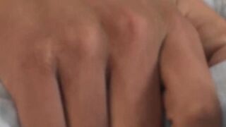 Twink Adrian strokes cock while grabbing his balls