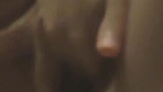 Japanese babe caught on cam poking her tight twat