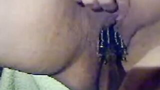 Spiky Hairy Brush Pleasures Pussy on Webcam