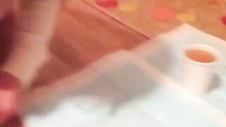 Horny babe records herself filling a cup with warm pee