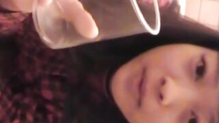 Perverted Asian lets us watch her fill a cup with pee