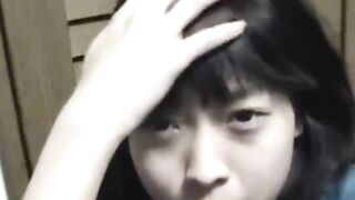 Perverted Asian lets us watch her fill a cup with pee
