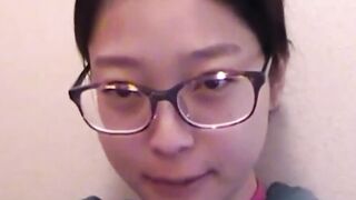 Perverted Asian lets us watch her fill a cup with pee