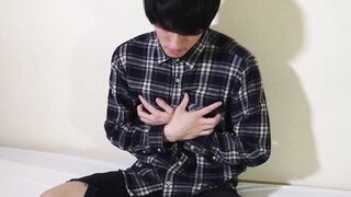 Japanese twink gets rock hard before slippery handjob