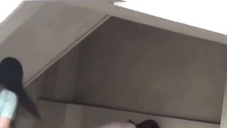 Two students tailed by a watcher for their pee captures