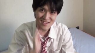 Japanese twink strokes throbbing cock to climax