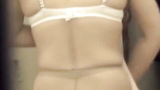 Hidden cam watches Japanese babe peel off pantyhose