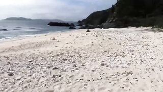 Naughty Yoshi Kawasaki jerks and cums hard on beach