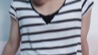 Young Japanese strokes cock while being serviced
