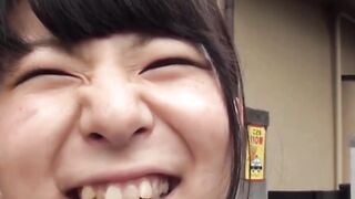 Japanese schoolgirl pisses her panties while walking down the streets