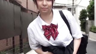 Japanese schoolgirl pisses her panties while walking down the streets