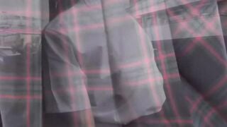 Japanese schoolgirl pisses her panties while walking down the streets