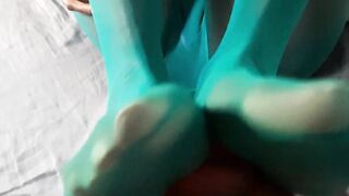 Toejob close-up with green Nylons
