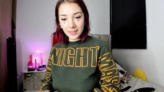 Pretty red haired web cam bimbo teases you with her Bombshell body