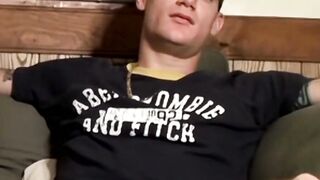 Handsome Glock rubs his cock against his own sexy feet