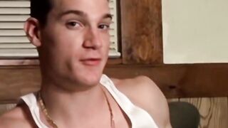 Handsome Glock rubs his cock against his own sexy feet