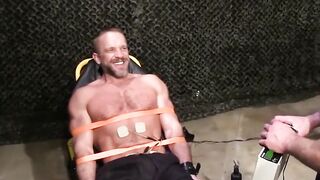 Kinky captor shocks Dirk Cabers nipples cock and balls cruelly