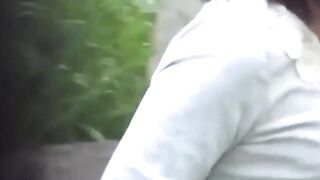 Shameless Asian babe pees outdoors in voyeuristic view