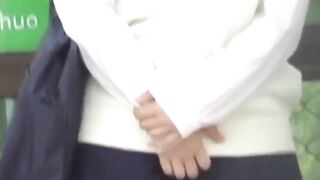 Lusty Japanese finds secluded spot to finger hairy cunt
