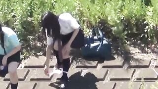 Urinating Asian women clueless of lusty secret lens