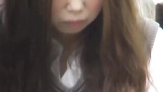 This Japanese honey caught on cam pussy rubbing outdoors