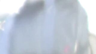 Distressed Japanese lady caught on camera urinating outside