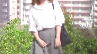 Distressed Japanese lady caught on camera urinating outside