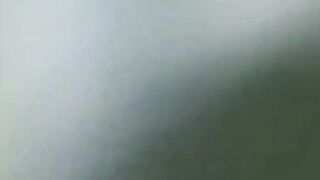 Distressed Japanese lady caught on camera urinating outside