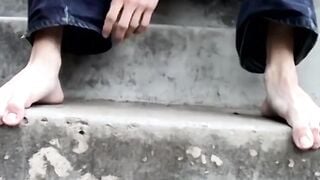 Ian Madrox teases with his feet in this steamy outdoor scene