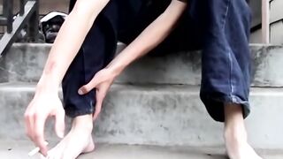 Ian Madrox teases with his feet in this steamy outdoor scene