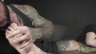 Two muscle hunks lick feet and jerk off together in lust