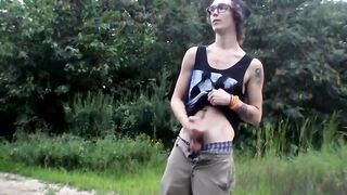 Tattooed glasses thug pees then jerks cock outdoors