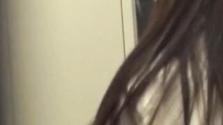 Covert cam films Japanese babe peeling off her nylons