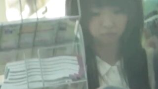 Rain didnt stop this Asian cutie from fingering her twat outdoors