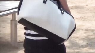 Oriental women filmed as their boobs sway loose under shirts