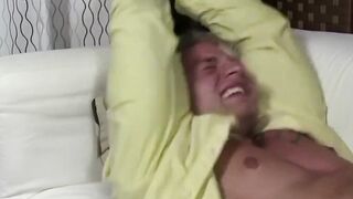 Bound twink jock giggles uncontrollably from foot tickles