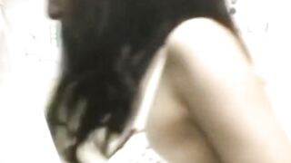 Peeping cam waits to snag a Japanese womans perky tits