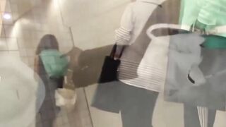 Japanese babes caught on spycam pissing in a public toilet