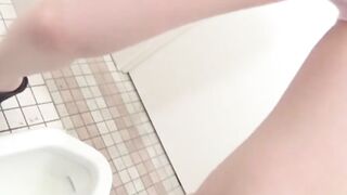 Japanese babes caught on spycam pissing in a public toilet