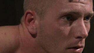 Slaves Scott Riley and Eli Hunter compete to satisfy their kinky masters