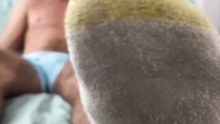 Bearded stud admires his own feet while filming solo jerkoff