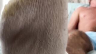 Bearded stud admires his own feet while filming solo jerkoff